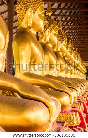 Monk golden image of Buddha