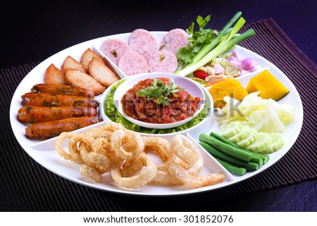 Mix Northern Thai food - Sai Aua (Northern Thai Spicy Sausage), Naem (Sour pork), Cab-Moo (pork snack), Moo-Yor (preserved pork sausage), Nam Prik Aong (Northern Thai Meat and Tomato Spicy Dip)