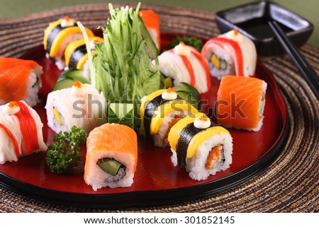 Mix Sushi roll set in wood dish. Sushi is most popular Japanese food in the world