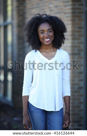 African American, adult student, girl smiling outside white teeth, university, united states, model, teenager, teenage, teen, young beautiful girl, female portrait, black, outdoor, happy young girl