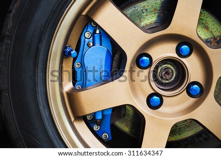 Car wheels with blue brake.