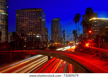 During the blue hour, rush hour traffic in downtown Los Angeles, California.