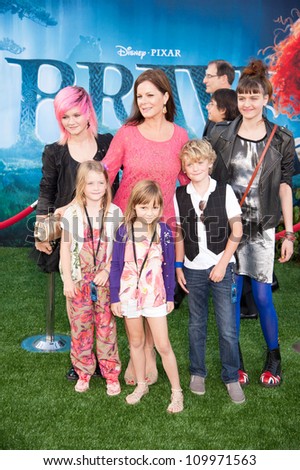 HOLLYWOOD, CA - JUNE 18: Marcia Gay Harden and family arrives at the Los Angeles Film Festival premiere of \'Brave\' at Dolby Theatre on June 18, 2012 in Hollywood, California.