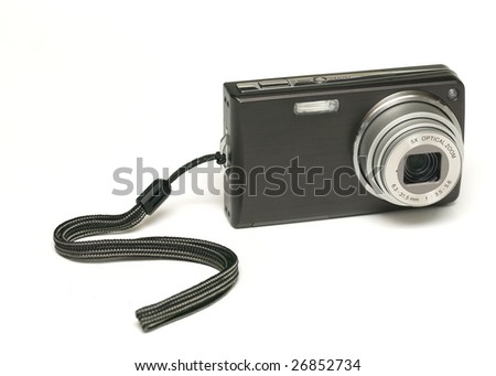 Point and shoot digital camera on white background.