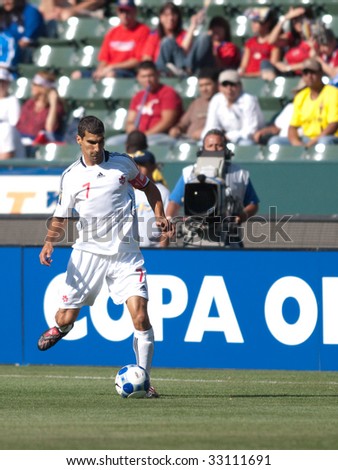 CARSON, CA. - JULY 3: Concacaf Gold Cup soccer match, Canada vs. Jamaica at the Home Depot center in Carson. Paul Stalteri passing the ball on July 3, 2009.