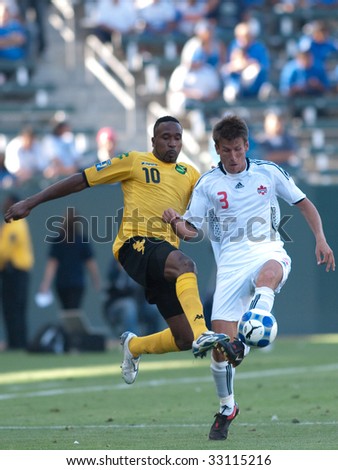 CARSON, CA. - JULY 3: Concacaf Gold Cup soccer match, Canada vs. Jamaica at the Home Depot center in Carson. Ricardo Fuller and Michael Klukowski fighting for the ball on July 3, 2009.