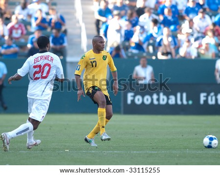 CARSON, CA. - JULY 3: Concacaf Gold Cup soccer match, Canada vs. Jamaica at the Home Depot center in Carson. Rodolph Austin waiting to receive a pass while Patrice Bernier defends on July 3, 2009.