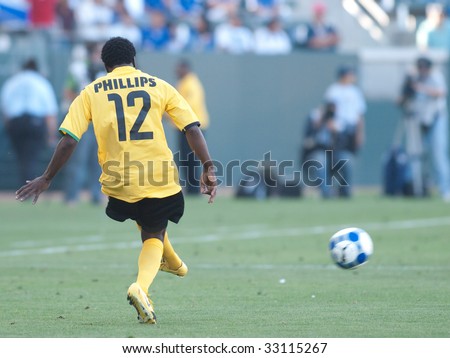 CARSON, CA. - JULY 3: Concacaf Gold Cup soccer match, Canada vs. Jamaica at the Home Depot center in Carson. Demar Phillips passes the ball on July 3, 2009.