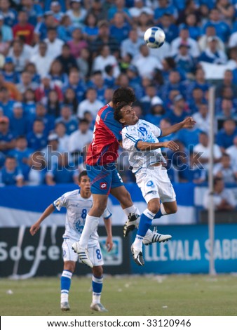 CARSON, CA. - JULY 3: Concacaf Gold Cup soccer match, Costa Rica vs. El Salvador at the Home Depot center in Carson. William Reyes and Celso Borges up in the air for a header on July 3, 2009.