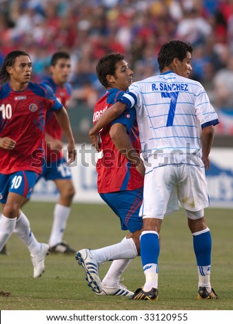 CARSON, CA. - JULY 3: Concacaf Gold Cup soccer match, Costa Rica vs. El Salvador at the Home Depot center in Carson. Ramon Sanchez and Celso Borges fighting for position on July 3, 2009.