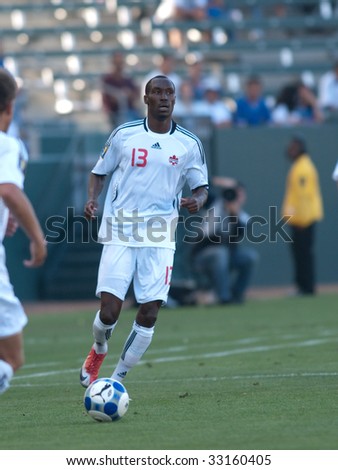 CARSON, CA. - JULY 3: Concacaf Gold Cup soccer match, Canada vs. Jamaica at the Home Depot Center in Carson. Atiba Hutchinson with the ball. July 3, 2009.