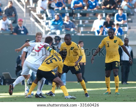 CARSON, CA. - JULY 3: Concacaf Gold Cup soccer match, Canada vs. Jamaica at the Home Depot Center in Carson. Michael Klukowski and Ricardo Gardner fighting for the ball during the game. July 3, 2009.