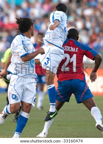 CARSON, CA. - JULY 3: Concacaf Gold Cup soccer match, Costa Rica vs. El Salvador at the Home Depot Center. Alexander Escobar, Marvin Gonzalez and Froylan Ledezma fighting for the ball. July 3, 2009.