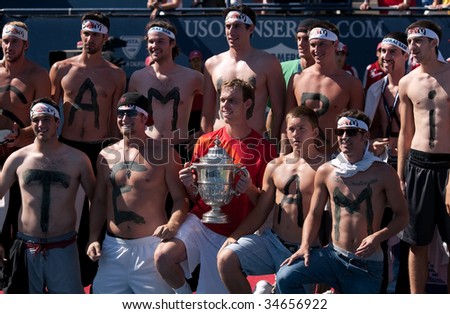 LOS ANGELES, CA. - AUGUST 2: Sam Querrey and his friends pose for photographers after winning the mens finals of the L.A. Tennis Open August 2, 2009 in Los Angeles.