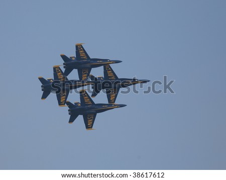 SAN FRANCISCO, CA. - OCTOBER 10: Blue Angels flying in a tightly grouped formation over the bay area during Fleet Week on October 10th 2009 in San Francisco, CA.