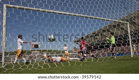 CARSON, CA. - OCTOBER 25: Dynamo defense is beat by Michael Lahoud\'s goal during the Chivas USA vs. Houston Dynamo match on October 25th, 2009 at the Home Depot Center in Carson.