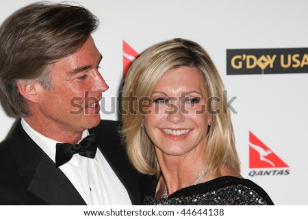 HOLLYWOOD, CA. - JANUARY 16: John Easterling (L) and Olivia Newton-John (R) attend the G\'Day USA black tie gala on January 16, 2010 at Hollywood and Highland Grand Ballroom in Hollywood.