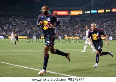 CARSON, CA. - MAY 7: New York Red Bulls F Thierry Henry #14 (L) celebrates an early goal with New York Red Bulls F Luke Rodgers #9 (R) during the MLS game on May 7, 2011 at the Home Depot Center.