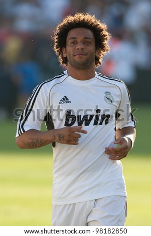 LOS ANGELES - JULY 16: Real Madrid C.F. defender Marcelo #12 during the World Football Challenge game between Real Madrid & the Los Angeles Galaxy on July 16 2011 at the Los Angeles Memorial Coliseum in Los Angeles, CA.