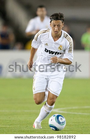 LOS ANGELES - JULY 16: Real Madrid C.F. M Mesut Ozil #23 during the World Football Challenge game between Real Madrid & the Los Angeles Galaxy on July 16 2011 at the Los Angeles Memorial Coliseum in Los Angeles, CA.