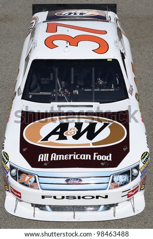 FONTANA, CA. - OCT 9: Sprint Cup Series driver Dave Blaney in the A&W All American Food #37 car during the Pepsi Max 400 practice on Oct 9 2010 at the Auto Club Speedway.