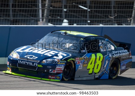 FONTANA, CA. - OCT 9: Sprint Cup Series driver Jimmie Johnson in the Lowe\'s #48 car during the Pepsi Max 400 practice on Oct 9 2010 at the Auto Club Speedway.