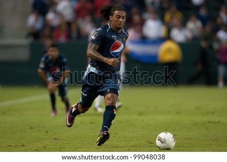CARSON, CA. - AUG 16: C.D. Motagua M Guillermo Ramirez #11 during the CONCACAF Champions League game between Club Motagua & Los Angeles Galaxy on Aug 16 2011 at the Home Depot Center.