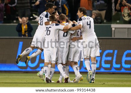 CARSON, CA. - MAY 14: Los Angeles Galaxy celebrate a goal scored off a free kick during the MLS game on May 14 2011 at the Home Depot Center in Carson, CA.