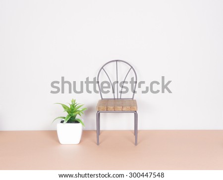 plastic plant and mini chair, minimalism style