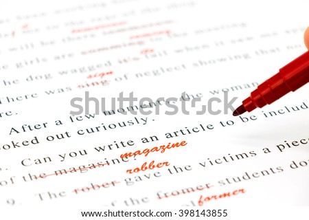 red pen marked on wrong spelling and write correct word above