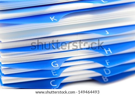 Blue organizer by letters isolated on white background