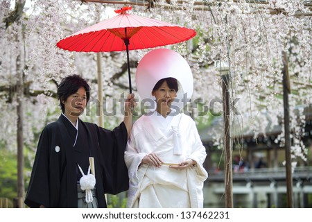 KYOTO, JAPAN-APRIL 12: Celebration of a typical wedding in Japan on April 12,2013 in Kyoto, Japan.