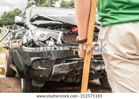 Generic compact car damaged in a rollover accident. Car crash wreck