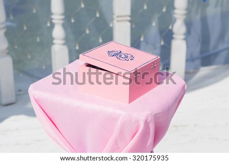 Beautifully decorated pink box for wedding rings