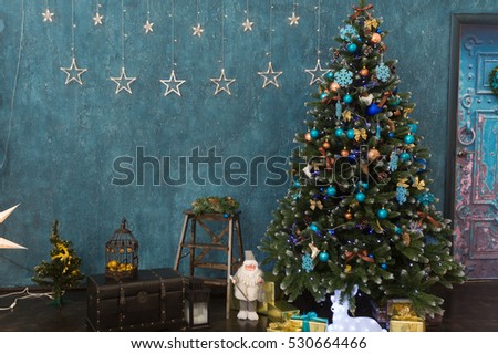 Beautiful holiday decorated interior room with Christmas tree and presents under it, horizontal shot