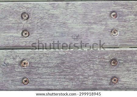 Close up top side of dirty old green color on wood chair and screw texture background