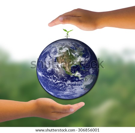 Protect world and young plant and tree with two hand. world photo from NASA