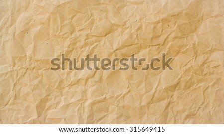 Abstract brown crumpled paper for backgrounds : crease of brown paper textures backgrounds for design,decorative. paper textures concept.