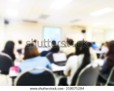 Blur people study or lecture or meeting or do workshop in classroom with notebook