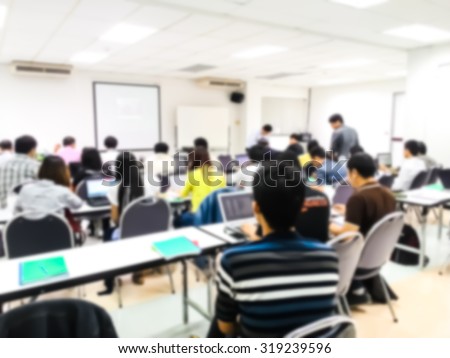 Blur behind people study or lecture or meeting or do workshop in classroom with notebook in master degree classroom at thailand