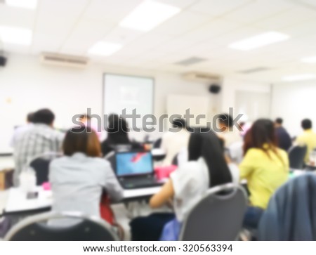 Blur student during study or lecture and quiz or exams from teacher or professor in classroom with notebook in master degree of industrial management programs or MBA at Thailand university