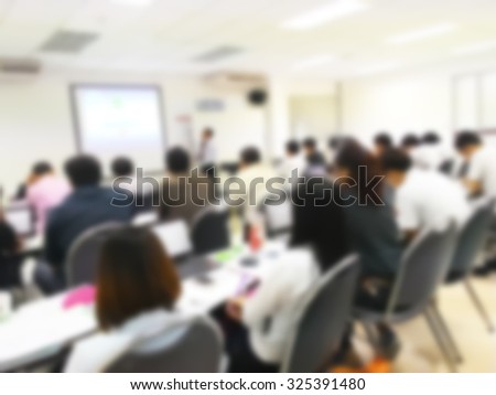Blur student during study or lecture and quiz with teacher or professor in classroom with notebook in master degree of industrial management Engineering programs or MBA at Thailand university