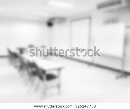 Blur Class room chair and table with white board and projector screen. white black colour concept.