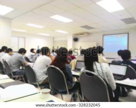 Blur student during study or lecture and quiz or exams from teacher or professor in classroom with notebook in master degree of industrial management programs or MBA class. study concept.