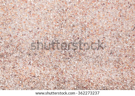 background of sand and small gravel stone texture on the floor.