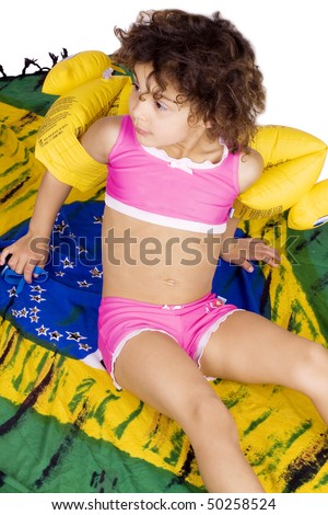 brazilian flag bikini. laying on a Brazilian flag