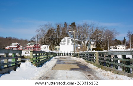 A close view of plowed snow on the town pier of Searsport Maine in winter.