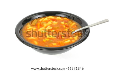 A bowl of fresh vegetable canned soup.