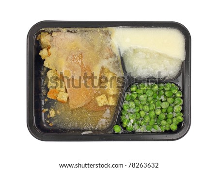 A solidly frozen turkey dinner from the freezer.