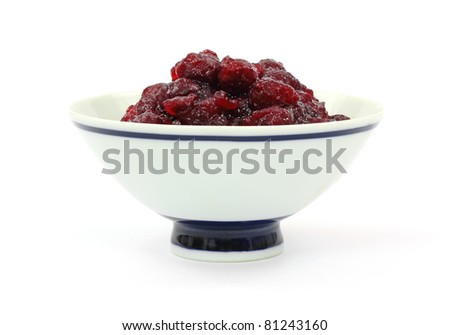 A front view of canned cranberry sauce with whole berries.